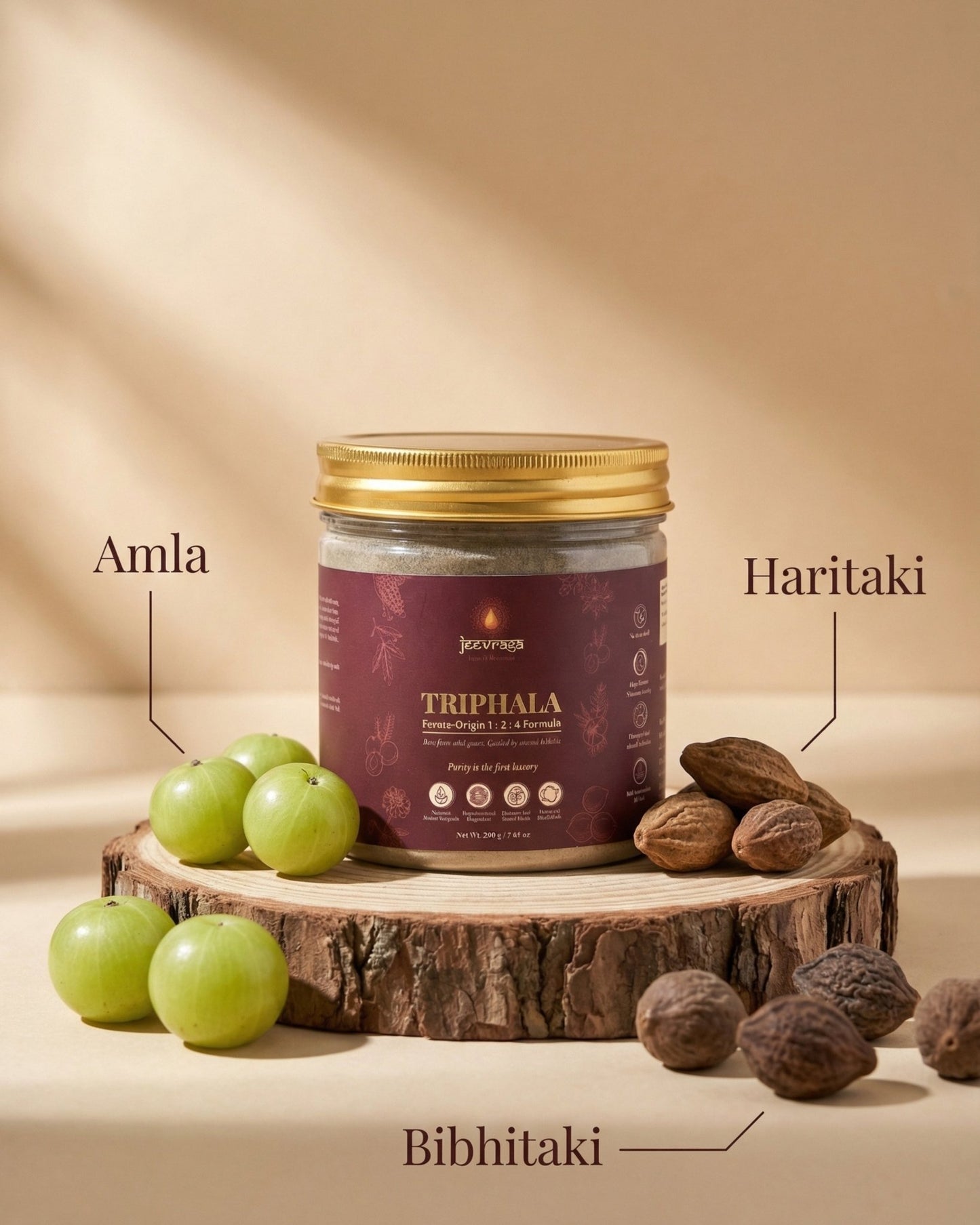 Triphala product with Amla, Haritaki, and Bibhitaki on a wooden surface